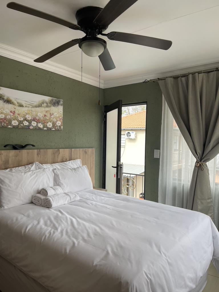 Warmly lit Urban Rest guest room