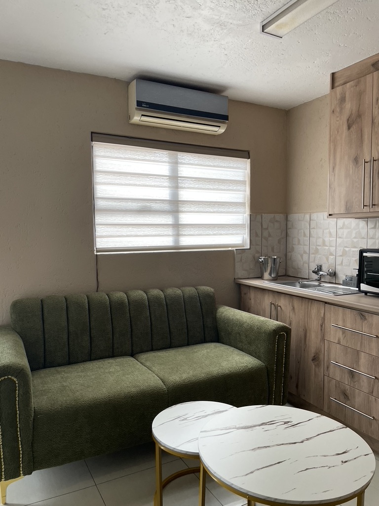 Urban Rest family room kitchenette and lounge